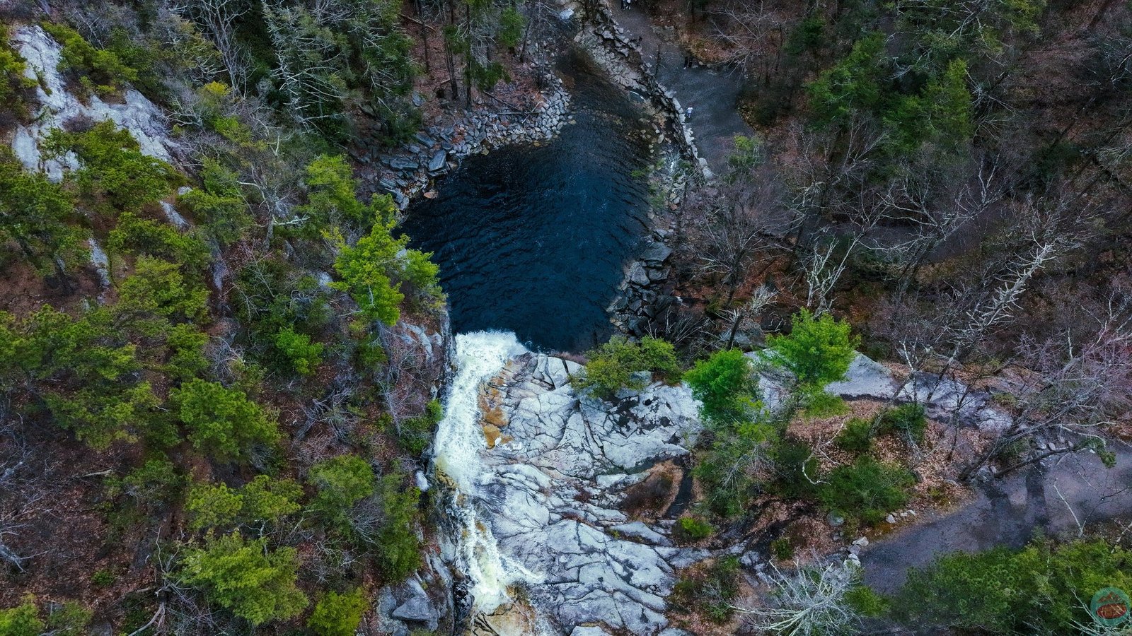Aerial view of a waterfall pool in a New York state park